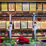 Pull tabs line the wall of the Madison Avenue Pub. (Olivia Vanni / The Herald)