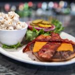 A classic bacon cheeseburger is half-price on Tuesdays at the Madison Avenue Pub. (Olivia Vanni / The Herald)