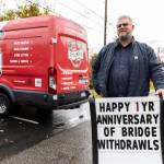 Stollwerck Plumbing owner J.D. Stollwerck outside his business along Fifth Street in Mukilteo. He lives on the other side of Edgewater Bridge in Everett and has to drive the nearly 10-mile detour. (Olivia Vanni / The Herald)
