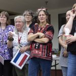 Early Learning Center teachers and staff become emotional as people thank them for their time and dedication on Wednesday, June 25, 2025 in Everett, Washington. (Olivia Vanni / The Herald)