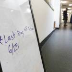 A sign announcing the last day of school sits in the hallway as people pack up on Wednesday, June 25, 2025 in Everett, Washington. (Olivia Vanni / The Herald)