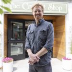 The Crumpet Shop owner Cooper Golding outside of their new location on Tuesday, June 24, 2025 in Edmonds, Washington. (Olivia Vanni / The Herald)