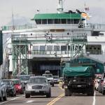 The MV Puyallup. a ferry capable of carrying 202 cars, offloads at the Edmonds Ferry dock on Friday, Sept. 21, 2018 in Edmonds, Wa. (Andy Bronson / The Herald)