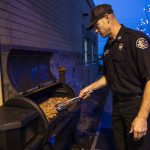 Todd Stark grills up chicken for Everett Fire Station Ones dinner. (Olivia Vanni / The Herald)
Todd Stark grills up chicken for Everett Fire Station Ones dinner. (Olivia Vanni / The Herald)
