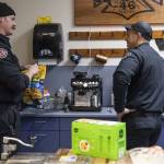 Ryan Fromm and Mike Aquino chat in the kitchen of Fire Station One on Tuesday, Dec. 10, 2024 in Everett, Washington. (Olivia Vanni / The Herald)
Firefighters Ryan Fromm and Mike Aquino chat in the kitchen of Everett Fire Station One. (Olivia Vanni / The Herald)