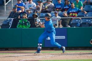 AquaSox outfielder Jonny Farmelo watches the ball off his bat during Everett's 7-5 win against the Eugene Emeralds at Funko Field on Aug. 31, 2025. (Joe Pohoryles / The Herald)