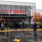 Customers walk in and out of Fred Meyer along Evergreen Way in 2022 in Everett. (Olivia Vanni / The Herald)