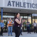 Explorer Middle School Principal Kendrah Leone speaks speak before a tour of the new athletics building on Oct. 7, 2025 in Everett, Washington. (Olivia Vanni / The Herald)