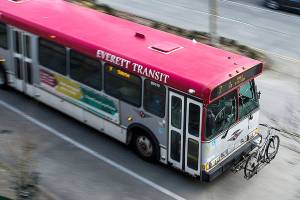 An Everett Transit bus drives along Hewitt Avenue in downtown Everett on Friday, March 9, 2018. (Ian Terry / The Herald)