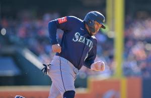Seattle's Josh Naylor heads home to score in the second inning of Game 4 of the ALDS between the Tigers and the Seattle Mariners at Comerica Park in Detroit on Wednesday, Oct. 8, 2025. (Robin Buckson / The Detroit News / Tribune News Services)