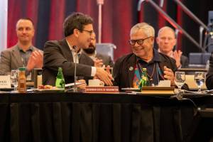 Washington Gov. Bob Ferguson, left, shakes hands with Cowlitz Indian Tribe Chairman Bill Iyall after signing an executive order to improve the state’s relations with tribal governments on Wednesday. (Photo courtesy of Washington governor’s office)