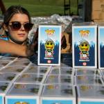 Lily Lamoureux stacks Weebly Funko toys in preparation for Funko Friday at Funko Field in Everett on July 12, 2019. Kevin Clark / The Herald)
