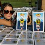 Lily Lamoureux stacks Weebly Funko toys in preparation for Funko Friday at Funko Field in Everett on July 12, 2019.  Kevin Clark / The Herald)