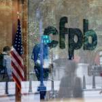 The Consumer Financial Protection Bureau logo is seen through a window at the CFPB offices in Washington, D.C., on Sept. 23, 2019. (Ting Shen / The New York Times)
