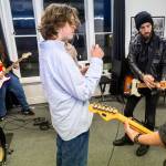 The founder of the Music Circle Jonathan Olson leads a group lesson on Dec. 1, 2025 in Everett, Washington. (Olivia Vanni / The Herald)