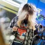 Heather Handyside, 13, head bangs while performing a song during a group lesson at The Music Circle on Dec. 1, 2025, in Everett, Washington. (Olivia Vanni / The Herald)