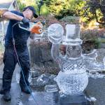 Kitburi works on some final touches of his ice sculpture on Sept. 17, 2025 in Marysville, Washington. (Olivia Vanni / The Herald)
