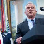 Health and Human Services Secretary Robert F. Kennedy Jr. speaks alongside President Donald Trump during an event announcing a drug pricing deal with Pfizer in the Oval Office of the White House in Washington, Sept. 30. Advisers to Kennedy have made consequential changes to the childhood vaccination schedule, delaying a shot that is routinely administered to newborns and discussing big changes to when or how other childhood immunizations are given. (Pete Marovich / The New York Times)