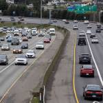 Cars move northbound and southbound along I-5 through Everett on Monday, Dec. 22, 2025. (Olivia Vanni / The Herald)