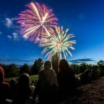 Thousands gather to watch fireworks over Lake Ballinger from Nile Shrine Golf Course and Lake Ballinger Park on Thursday, July 3, 2025, in Mountlake Terrace, Washington. (Olivia Vanni / The Herald)
