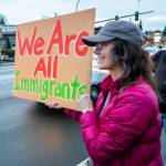 In a gathering similar to many others across the nation on Presidents Day, hundreds lined Broadway with their signs and chants to protest the Trump administration Monday evening in Everett. (Aaron Kennedy / Daily Herald)