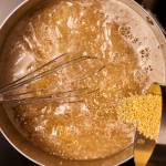 Cooking the grits. (Lauren Bulbin/The Washington Post; food styling by Carolyn Robb)