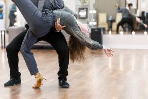 Dance instructor Antonio Samayo dips student Alexis Bartsch during her lesson at the Arthur Murray Dance Center on Tuesday, Jan. 13, 2026 in Everett, Washington. (Olivia Vanni / The Herald)