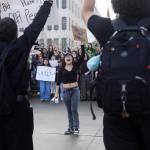 Liliana P., a senior at Everett High School, speaks during a walkout rally in protest of ICE outside of the Snohomish County Courthouse on Tuesday, Jan. 13, 2026, in Everett, Washington. (Olivia Vanni / The Herald)