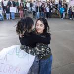 Cynthia Espinoza, right, and Liliana P., left, dance to huapango music during a walkout rally in protest of ICE outside of the Snohomish County Courthouse on Tuesday, Jan. 13, 2026, in Everett, Washington. (Olivia Vanni / The Herald)