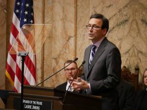 Gov. Bob Ferguson delivers his State of the State address on Tuesday in the House chamber at the Washington state Capitol. (Photo by Bill Lucia/Washington State Standard)