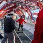 Phuong Truong shows where water drains inside Tommys Express Car Wash on Friday, Jan. 16, 2026 in Everett, Washington. (Olivia Vanni / The Herald)