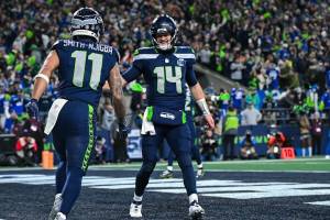 Seahawks quarterback Sam Darnold (14) celebrates with Jaxon Smith-Njigba (11) during a game against the San Francisco 49ers on Saturday, Jan. 17, 2026 at Lumen Field in Seattle, Washington. (Photo courtesy of the Seattle Seahawks)