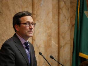 Washington Gov. Bob Ferguson at his State of the State address on Jan. 13, 2026. Ferguson did not discuss the budget cuts hes proposing in his speech but theyve stoked plenty of testimony in the first days of the 2026 legislative session. (Photo by Bill Lucia/Washington State Standard)