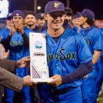 AquaSox manager Zach Vincej, who will not manage in 2026, is presented the Northwest League Championship trophy following Everetts series-clinching 6-3 win in Game 4 against the Eugene Emeralds at Funko Field on Sept. 13, 2025. (Joe Pohoryles / The Herald)
