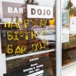 Birthday balloons hang inside Bar Dojo to celebrate the restaurants 13th year in business on Jan. 28 in Edmonds. (Olivia Vanni / The Herald)