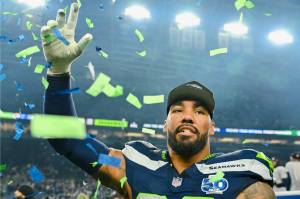 Seahawks defensive tackle Leonard Williams celebrates as confetti falls on Lumen Field after the Seahawks beat the Los Angeles Rams on Sunday, Jan. 25 in Seattle, Washington. (Photo courtesy of the Seattle Seahawks)