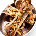 The roasted bone marrow with garlic confit, cornichon, bordelaise sauce, tomato-aged balsamic and grilled onion bread from Whiskey Prime Steakhouse at the Angel of the Winds Casino Resort on Thursday, Jan. 29, 2026 in Arlington, Washington. (Olivia Vanni / The Herald)