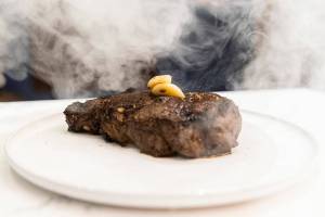 Whiskey Prime Steakhouse’s 18-ounce Chairman steak with garlic confit, 12-year aged balsamic vinegar and bourbon-soaked oak at the Angel of the Winds Casino Resort on Thursday, Jan. 29, 2026 in Arlington, Washington. (Olivia Vanni / The Herald)