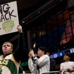A Seattle SuperSonics fan holds a sign before the Rain City Showcase in a preseason NBA game between the L.A. Clippers and the Utah Jazz at Climate Pledge Arena on Oct. 10, 2023, in Seattle. (Photo by Steph Chambers / Getty Images)