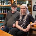 Garden Path Fermentation co-owner Ron Extract and head of production Katie Cochrane inside the tap room on Wednesday, Jan. 7, 2026 in Burlington, Washington. (Olivia Vanni / The Herald)