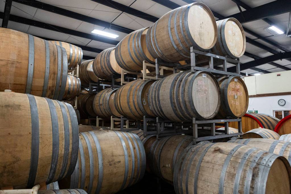 Barrels fill the inside of the cellar at Garden Path Fermentation on Wednesday, Jan. 7, 2026 in Burlington, Washington. (Olivia Vanni / The Herald)