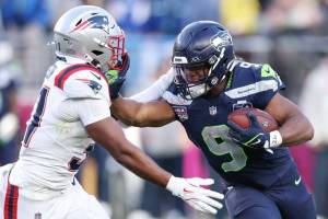 Seahawks running back Kenneth Walker III (9) will sign with the Kansas City Chiefs, according to The Athletic. (Getty Images / The Athletic)