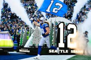 Seahawks fullback Brady Russell (38) runs out of the Lumen Field tunnel in Seattle, Washington prior to a game against the Minnesota Vikings on Nov. 30, 2025. (Photo courtesy of Edwin Hooper / Seattle Seahawks)