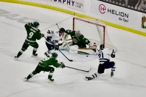 Silvertips goaltender Anders Miller squares up to a shot from Vees forward Ryden Evers (21) during Everetts 4-3 overtime win against Penticton at Angel of the Winds Arena on March 14, 2026. (Joe Pohoryles / The Herald)