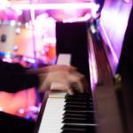 Dowon Kim plays the piano on March 6, 2026 at Butter Notes Cafe in Everett, Washington. (Will Geschke / The Herald)