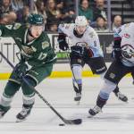 Everett Silvertips’ forward Julius Miettinen takes the puck down the ice in breakaway during the second round WHL playoff game against the Portland Winterhawks on Friday, April 11, 2025 in Everett, Washington. (Olivia Vanni / The Herald)