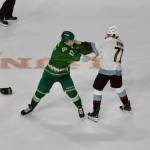 Silvertips forward Julius Miettinen engages in a fight with Winterhawks forward Reed Brown during Everetts 4-1 win against the Portland Winterhawks in Game 2 of the WHL Playoffs First Round at Angel of the Winds Arena on March 28, 2026. (Joe Pohoryles / The Herald)