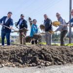 Community leaders and people involved in the Poplar Way Bridge project break ground during an event on Wednesday, April 8, 2026, in Lynnwood, Washington. (Olivia Vanni / The Herald)