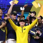 Head coach Dusty May of the Michigan Wolverines celebrates after defeating the UConn Huskies 69-63 in the National Championship of the 2026 NCAA Mens Basketball Tournament at Lucas Oil Stadium on Monday in Indianapolis, Indiana. (Michael Reaves / Getty Images / The Athletic)