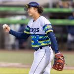 Luis Suisbel (8) of the Everett AquaSox reacts after another score crosses home plate during the game against the Tri-City Dust Devils on Tuesday, April 7, 2026 in Everett, Washington. (Olivia Vanni / The Herald)